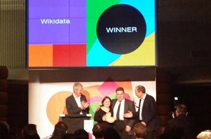 Wikidata representatives, Lydia Pintscher and Magnus Manske  receiving award from Nigel Shadboldt and Tim Berners-Lee.
