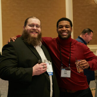 male attendees posing for a picture