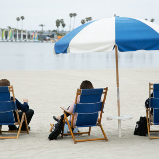 conference attendees sitting in beach chairs